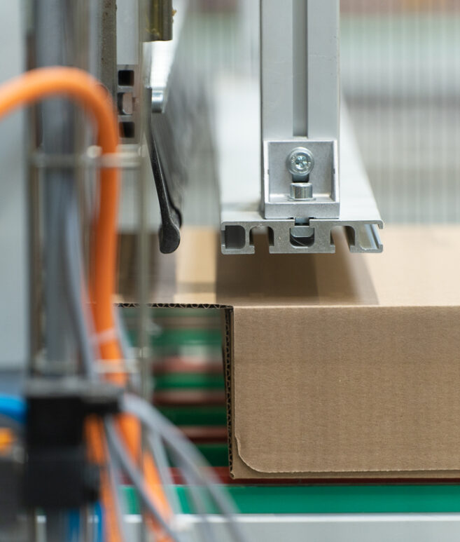 Industrial_Box_forming_packaging_unit_Box_gluing_with_hot_glue_Box_closing_unit_4-aspect-ratio-657-773
