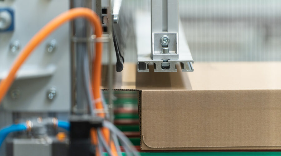 Industrial_Box_forming_packaging_unit_Box_gluing_with_hot_glue_Box_closing_unit_4-aspect-ratio-900-500