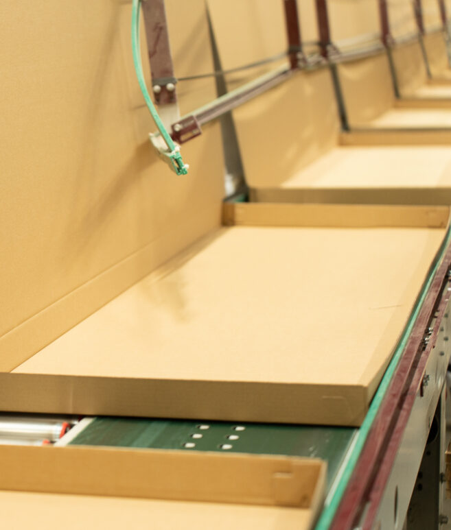 Fully_automated_multiformat_carton_box_forming_product_loading_system_robotic_packaging_cell_robotic_product_loading_sealin_solution_up_to_14_boxes_min_VMG_TECHNICS_bf8-aspect-ratio-657-773