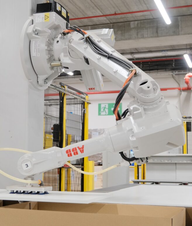 Automated_box_forming_product_loading_system_End_of_Line_Automation_robotic_packaging_cell_robotic_product_loading_sealin_15_boxes_min_VMG_TECHNICS_p5-aspect-ratio-657-773